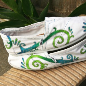 Custom, hand painted Color Swirl TOMS shoes featuring a green to blue ombre of a swirl design outlined in silver.