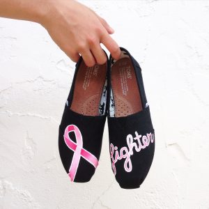 Custom, hand painted Breast Cancer Fighter TOMS shoes featuring the word "fighter" and the pink breast cancer awareness ribbon.